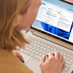 Man-using-Windows-Copilot-PC-to-work